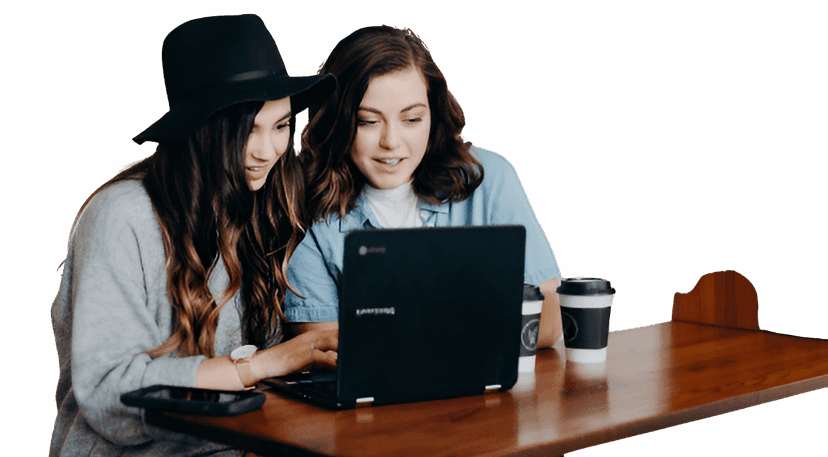 2 grils using the laptop